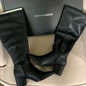 Knee high heeled boots